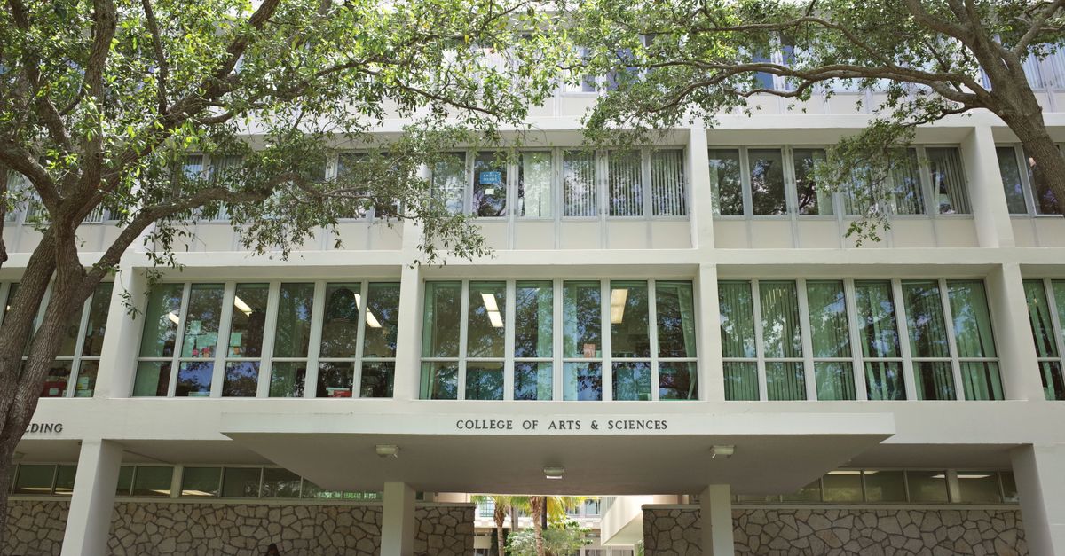 College of Arts & Sciences building at University of Miami, surrounded by lush trees.